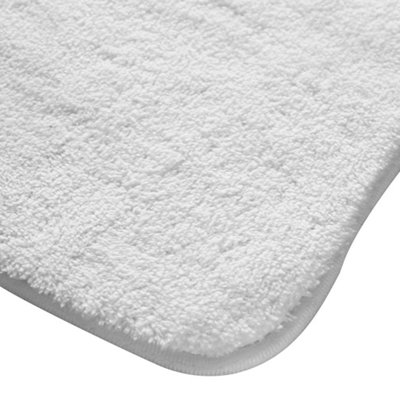 Summer landscape with hilly green field and forest in the distance (Rug