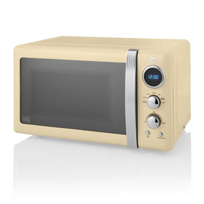 https://media.diy.com/is/image/KingfisherDigital/swan-retro-digital-microwave-cream-20-l-800-w-6-power-levels-including-defrost-setting-sm22030cn~5055322508982_01c_MP?$MOB_PREV$&$width=618&$height=618