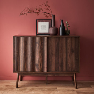 sweeek. 115cm buffet storage with wood effect Linear Dark wood colour 115x39.5x90 cm