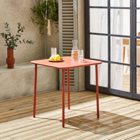 sweeek. 2-seater square steel garden table Amelia 70cm Terracotta 70x70x72.5 cm