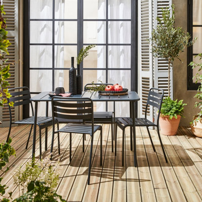 sweeek. 4-seater rectangular steel garden table with 4 chairs Amelia Anthracite 120x70x72.5 cm