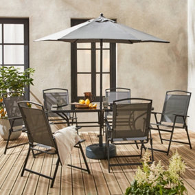 sweeek. 6-seater metal dining set with foldable chairs and parasol Sonia Grey 140x80x71.5 cm