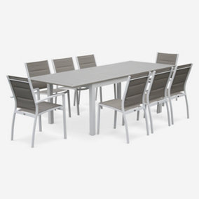 sweeek. 8-seater extendable aluminium garden table set with chairs Chicago 8 White 244x100x75 cm
