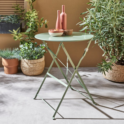 sweeek. Folding metal bistro garden table Diam.60cm seats 2 Emilia 60cm Sage Green 60x60x71 cm