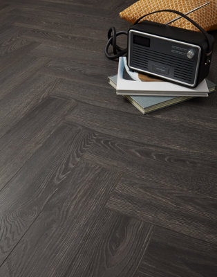 Swiss Krono Herringbone - Elba Oak Black 8mm Laminate Flooring. 1.23m² Pack