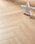 Swiss Krono Herringbone - Peterson Oak Light 8mm Laminate Flooring. 1.23m² Pack