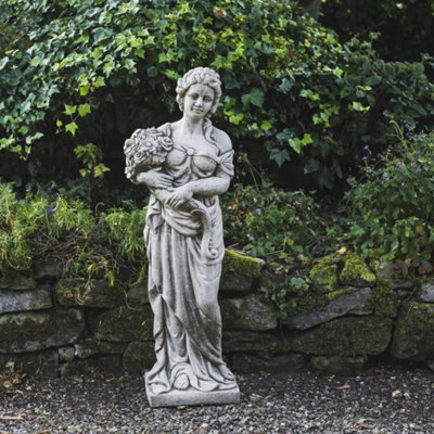 Tall Stone Cast Lady with Flowers