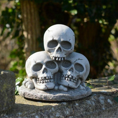 Three Skull Stone cast Garden Ornament