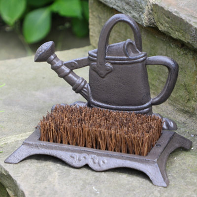 https://media.diy.com/is/image/KingfisherDigital/traditional-cast-iron-watering-outdoor-garden-can-boot-brush-scraper-for-garden-gifts~5060633941977_01c_MP?$MOB_PREV$&$width=618&$height=618