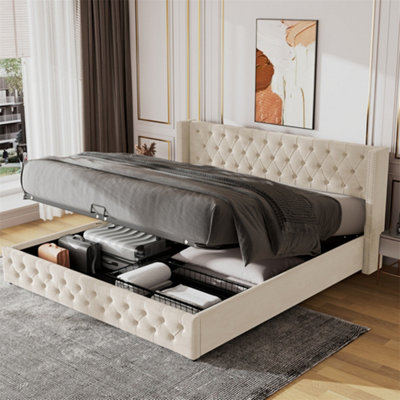 Beige upholstered bed with outlet storage