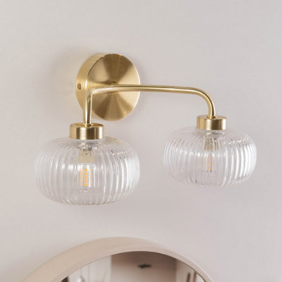 ValueLights Amaia Pair of Brushed Gold IP44 2 Way Clear Glass Wall Lights with LED Bulbs
