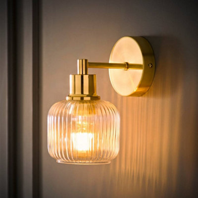 ValueLights Calpe Brushed Gold Ribbed Glass Shade Wall Light and Bulb