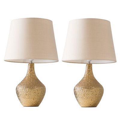 ValueLights Pair Of Modern Metallic Gold Indent Textured Ceramic Table Lamps With Beige Shades