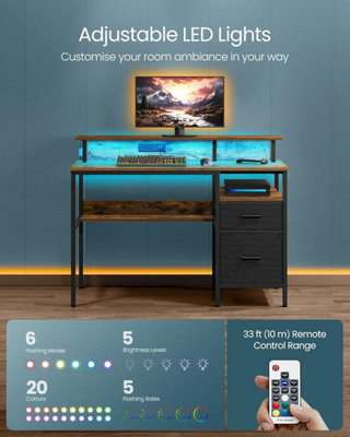 VASAGLE Corner Desk with LED Lighting and Integrated Power Outlets, Computer Station, Rustic Brown