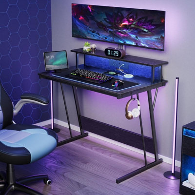 VASAGLE Gaming Desk with LED Lights and Built In Power Outlets Computer Desk with Monitor Shelf