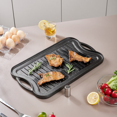 Versatile and Durable Reversible Cast Iron Griddle Pan with Smooth and Ribbed Sides for Stovetops, Ovens, and Induction Cookers