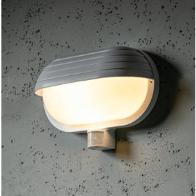 VESPA- CGC White Oval Eyelid Bulkhead Wall Light With Motion Sensor