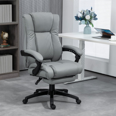 Reclining office chair with leg online rest