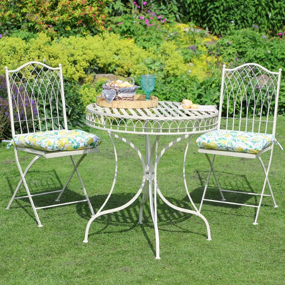 Cream metal garden table and deals chairs