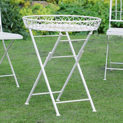 Folding chair with tray table store