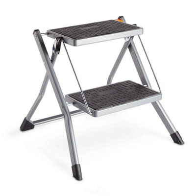 Compact folding outlet step stool