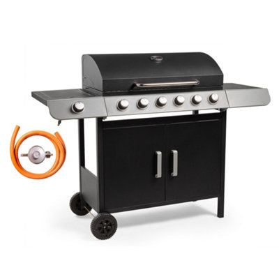 Gas grill with clearance storage