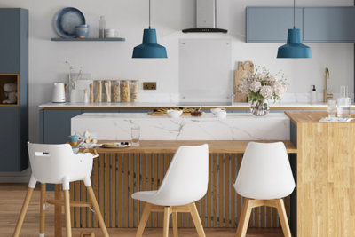 Vertical wooden wall panels under breakfast bar attached to a marble kitchen island.