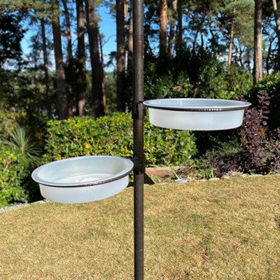 Bird feeder outlet water dish