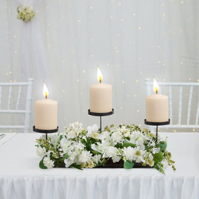Wedding Decor Candlesticks with Faux Flowers and Warm Light