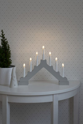 Welcome Light Candlestick wood matt white, 7 LED bulbs, 6xAA