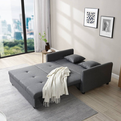 Reclining sofa with pull store out bed