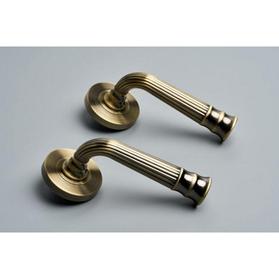 Whitby Lever on Large Rose Door Handle - Antique Brass - Pair - Designer Levers