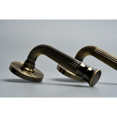 Whitby Lever on Large Rose Door Handle - Antique Brass - Pair - Designer Levers