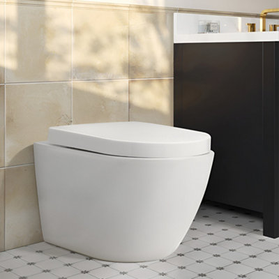 White Simple Wall Mounted Elongated Toilet without flush