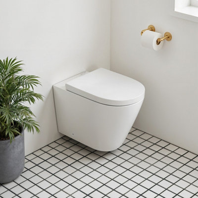 White Wall Mounted Elongated Toilet without flush DIY at B&Q
