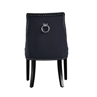 Windsor Cosmo LUX 7PCs Dining Set includes a Black Dining Table and Set of 6 Black Dining Chairs