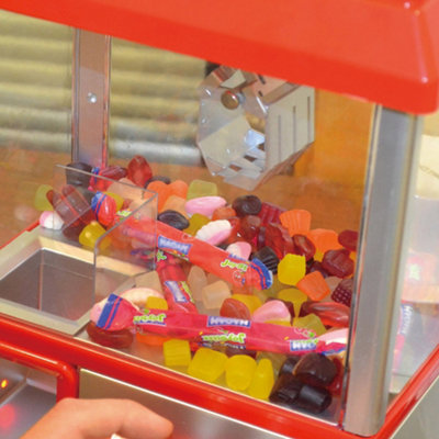 Winning Candy Grabber Arcade Machine Vibrant Retro Design