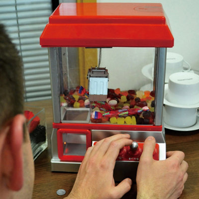 Winning Candy Grabber Arcade Machine Vibrant Retro Design