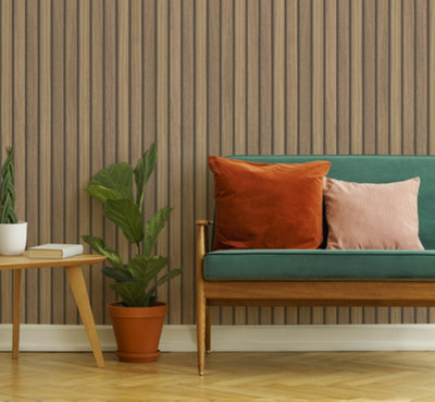 Vertical wood panel effect wallpaper in a living room with a teal sofa with burnt orange and pink cushions.