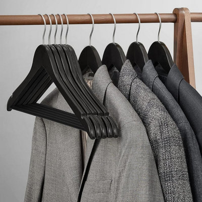 https://media.diy.com/is/image/KingfisherDigital/wooden-clothes-hangers-set-of-10-solid-wood-coat-suit-hangers-with-notched-shoulders-non-slip-for-jackets-shirts-trousers~1943431025970_01c_MP?$MOB_PREV$&$width=618&$height=618