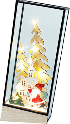 Xmas Haus Hurricane Glass Holder with Light Up Festive Village and Santa Scene Battery Operated