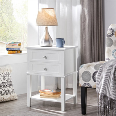 White nightstand deals with open shelf