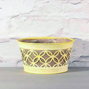 Yellow Detailed Fretwork Round Planter. Hessian Inner with a  Soft Plastic Liner. H10.7 cm.