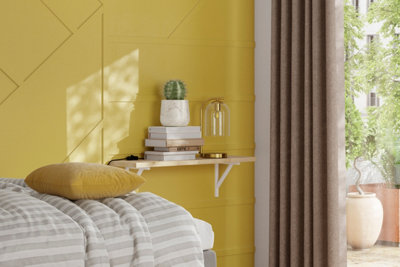 Bright yellow panelled feature wall with geometric design.