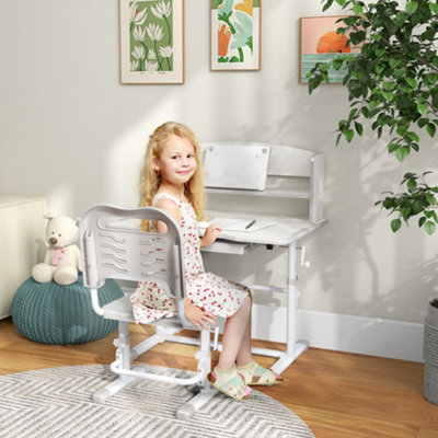 https://media.diy.com/is/image/KingfisherDigital/zonekiz-height-adjustable-kids-desk-and-chair-set-with-drawer-bookshelf-grey~5056725341848_01c_MP?$MOB_PREV$&$width=190&$height=190